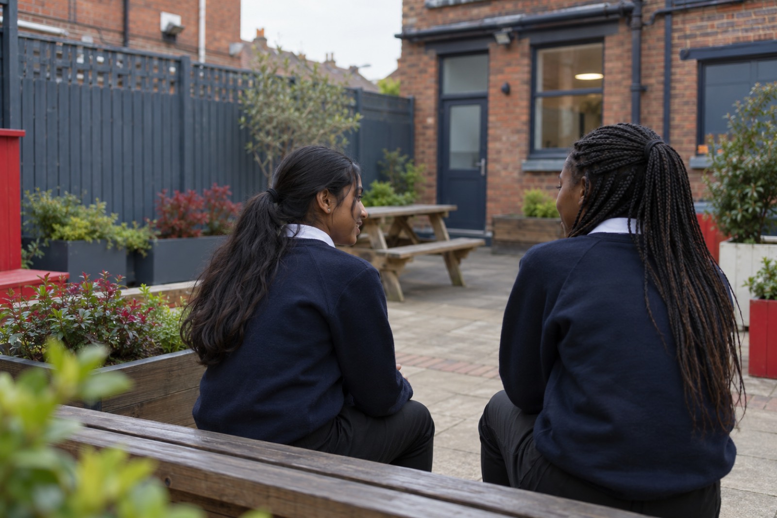 The school's small outdoor space with seating